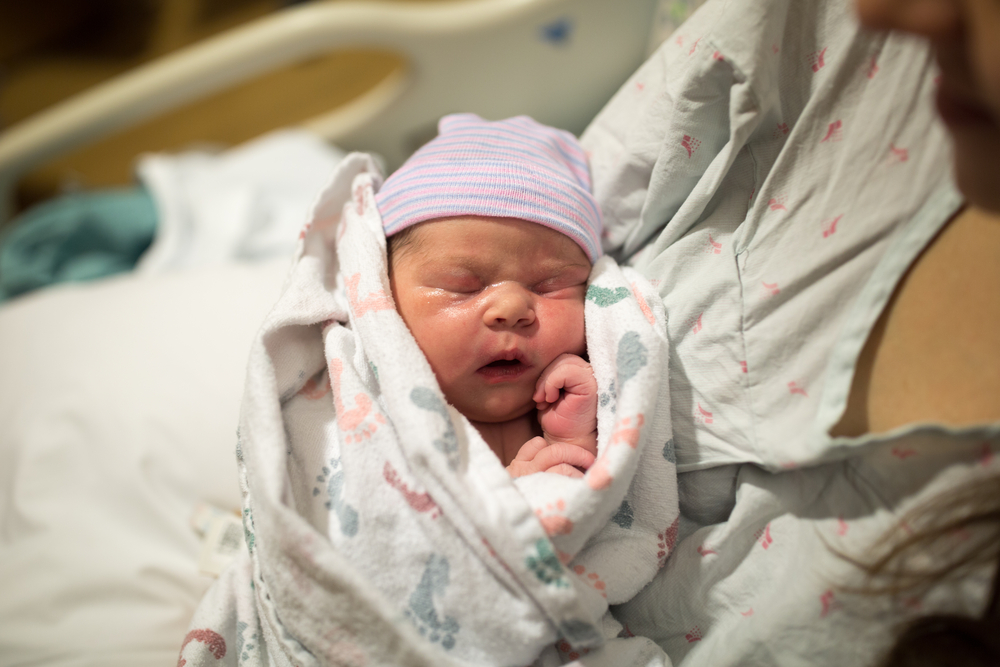 Nigerian woman gives birth in market while shopping for baby items